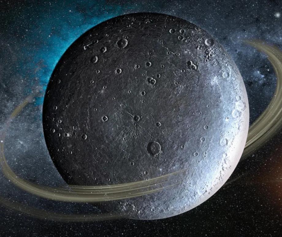 An illustration of a moon-like world surrounded by icy rings