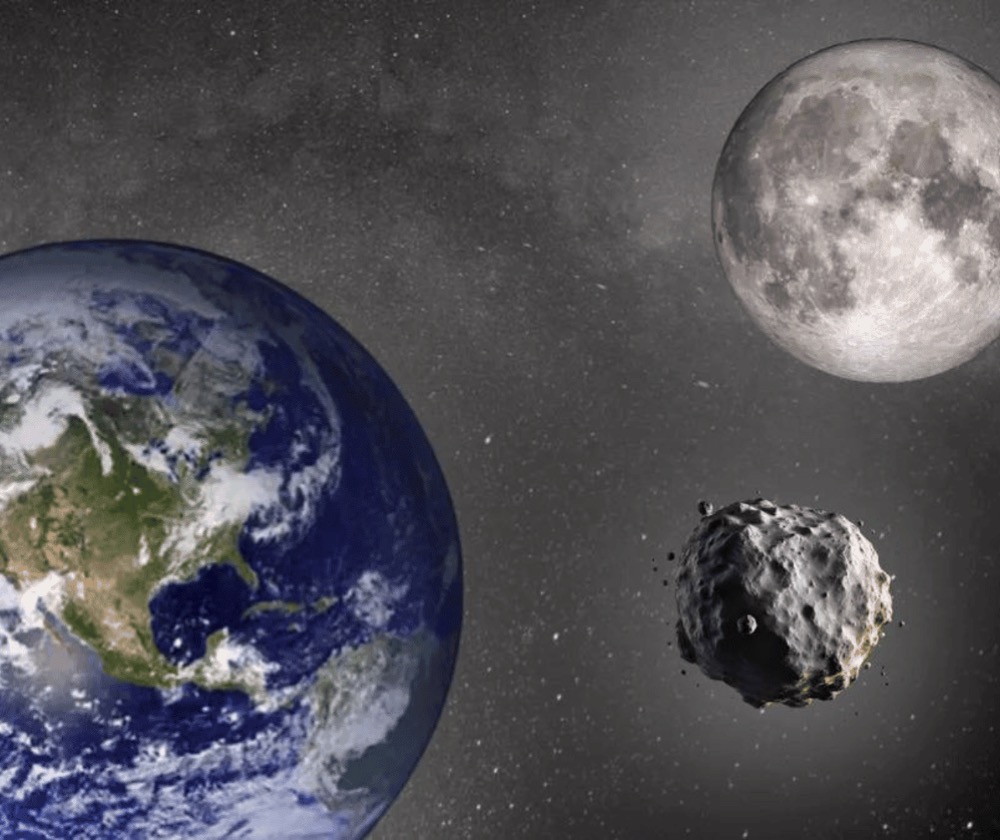 Artist's depiction of Earth, the Moon, and the asteroid 'mini-moon'