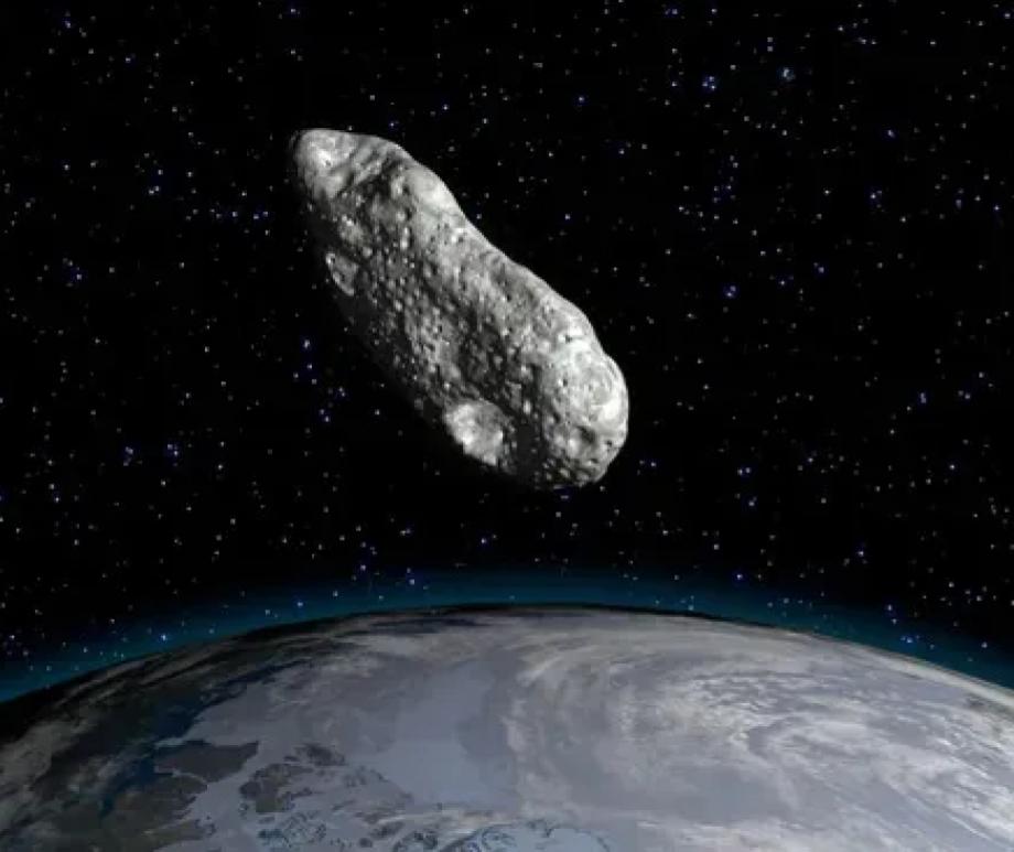 An illustration of a small asteroid orbiting the Earth. Our planet just acquired a new 'mini-moon' called 2024 PT5.