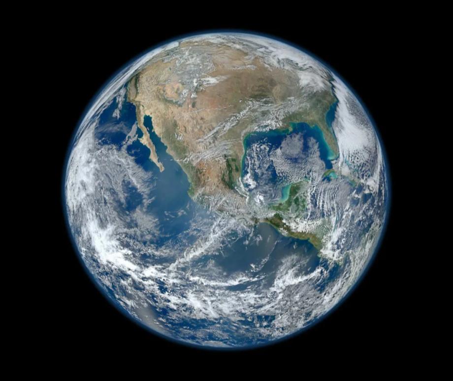 Passing stars jostle the solar system and could someday cause another planet to smash into Earth (shown here in a satellite image) or eject it from the solar system altogether.