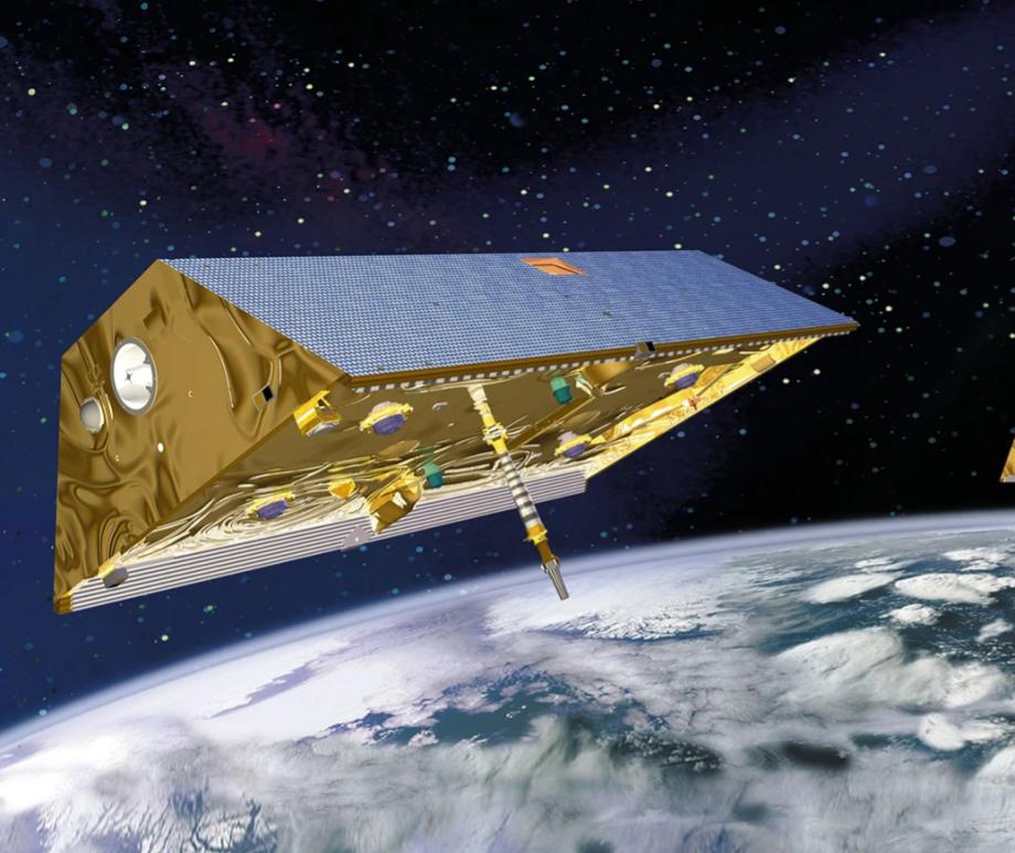 The GRACE satellites, which flew one in front of the other from 2002 to 2017 (shown in this artist rendering), detected gravitational changes on Earth