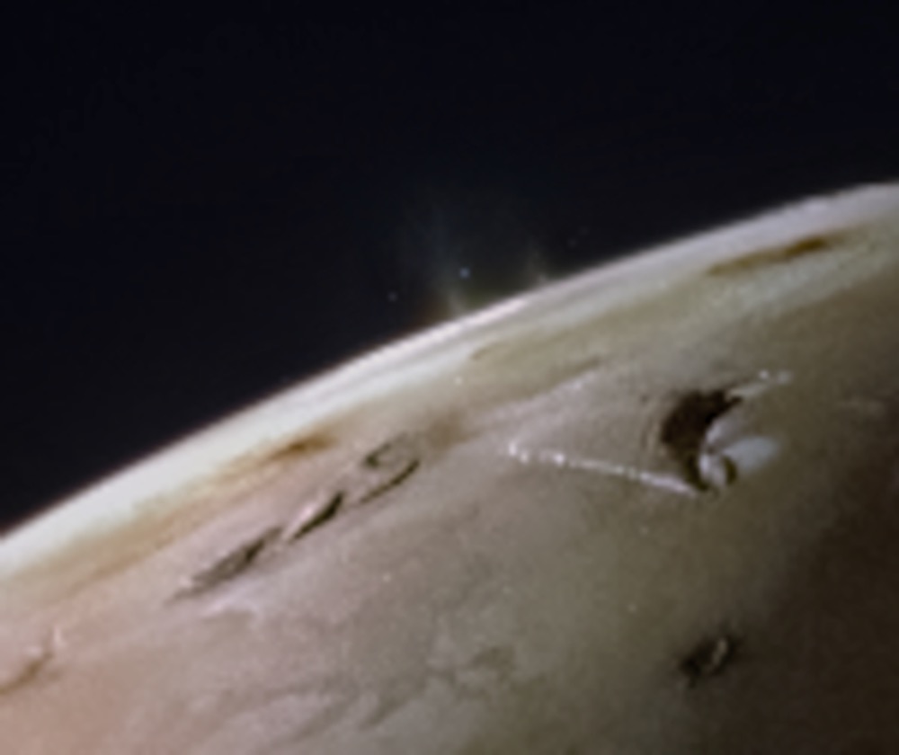 The JunoCam instrument aboard NASA’s Juno spacecraft captured two volcanic plumes rising above the horizon of Jupiter’s moon Io