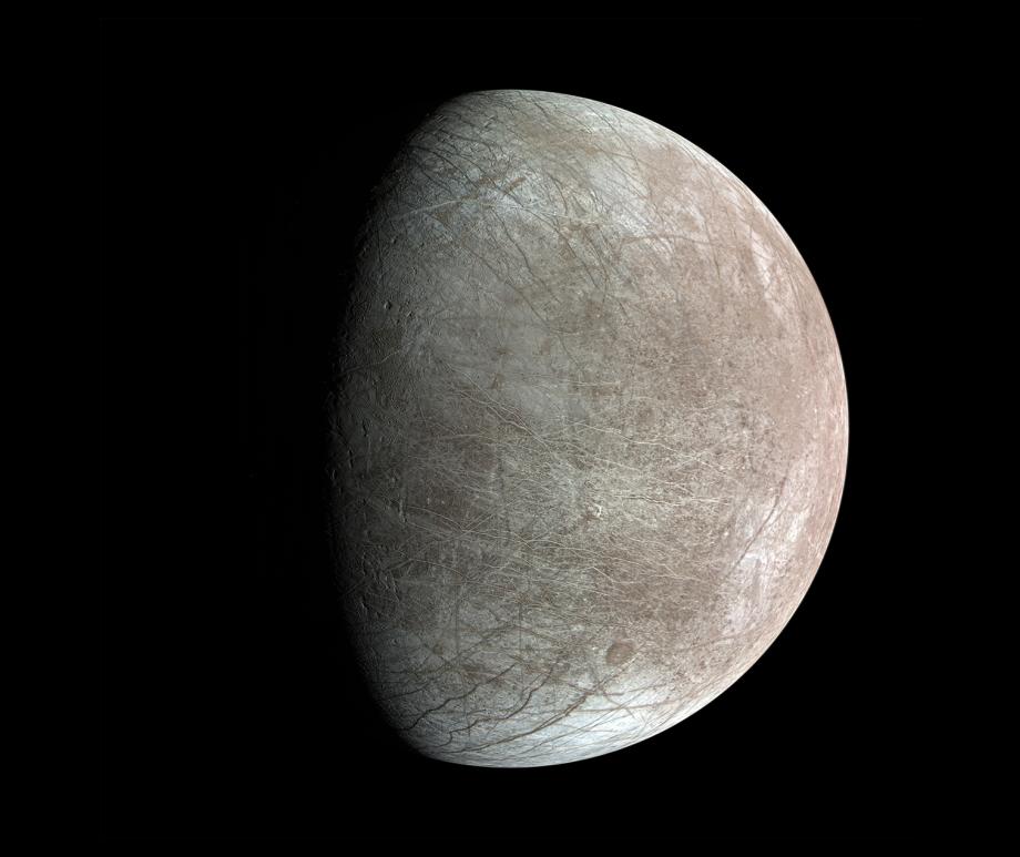 Juno flew within 355 kilometers of Europa in 2022, capturing new views of its surface and the ice below