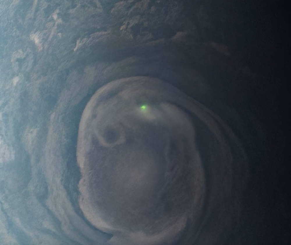 NASA's Juno spacecraft captured this view of a lightning strike in the clouds near Jupiter's north pole on Dec. 30, 2020