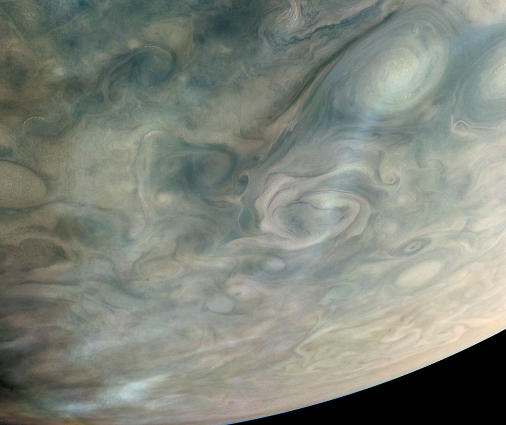 The JunoCam instrument captured this look at bands of high-altitude haze forming above cyclones