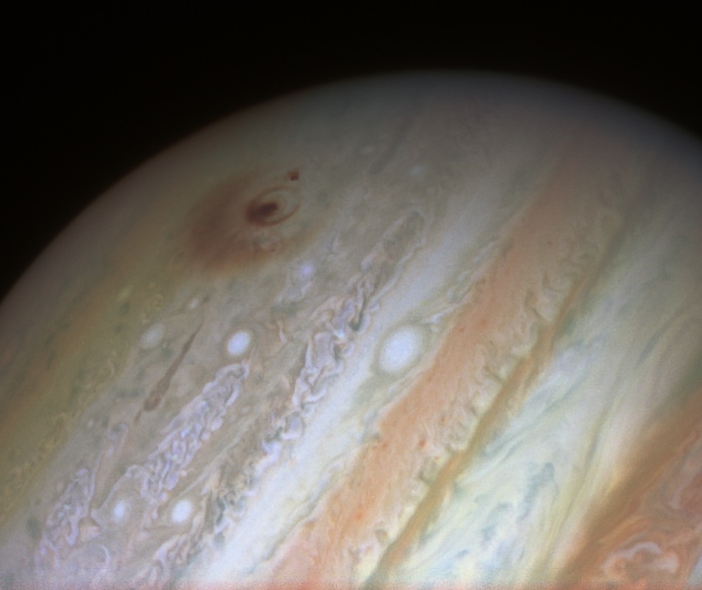 Fragments of comet Shoemaker-Levy 9 crashed into Jupiter over a period of several days in July 1994, leaving the dark scars seen in this image