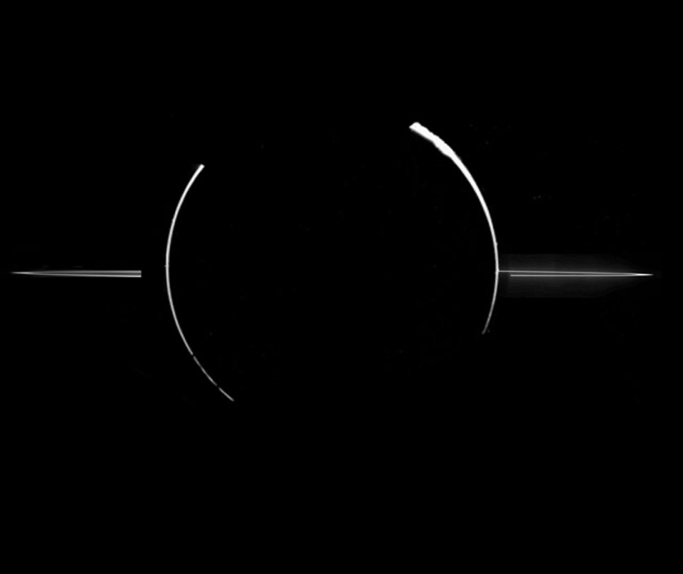 This isn’t Saturn, but Jupiter! The Galileo spacecraft imaged the rings in 1996 when the planet was backlit by the Sun and appears dark, so the faint rings could be seen