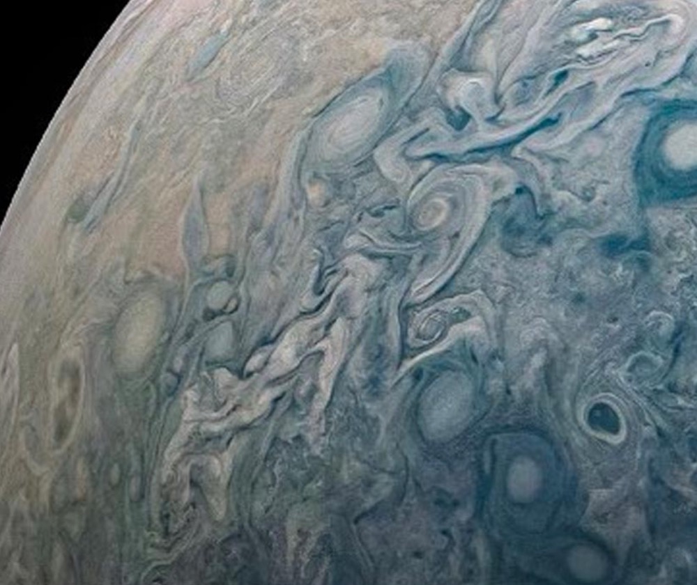 Juno took this image 14,600 miles (23,500 km) above the planet's cloud tops