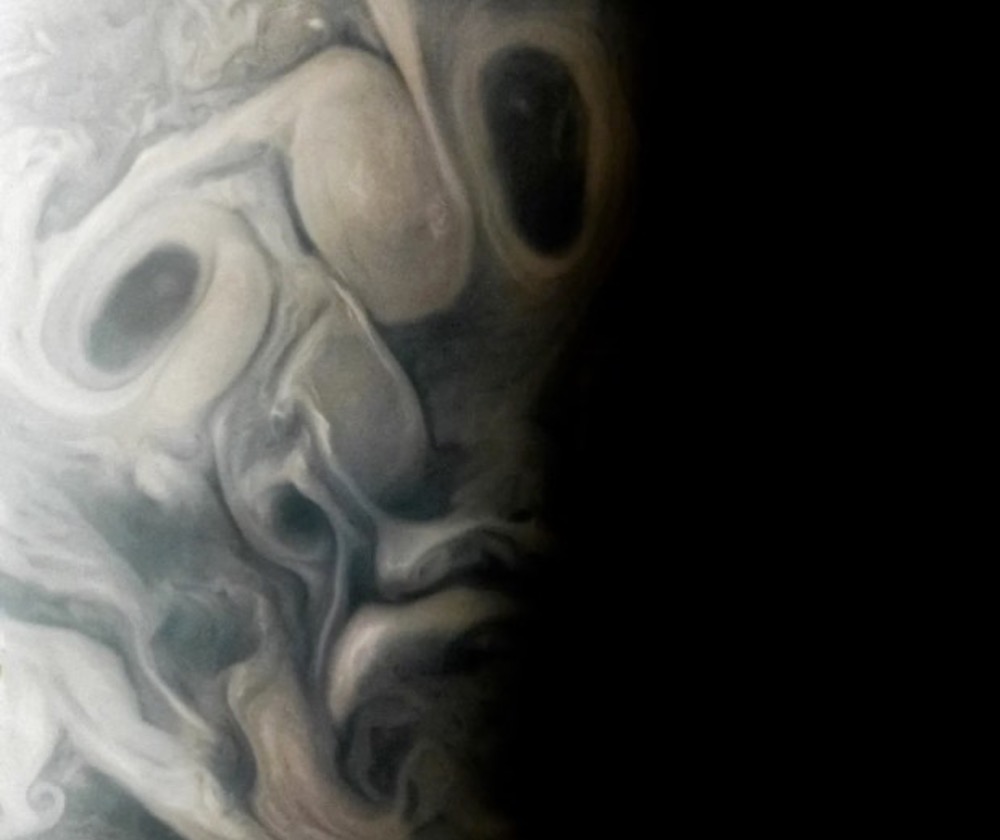 NASA shared this image of clouds and storms on Jupiter that resemble a face