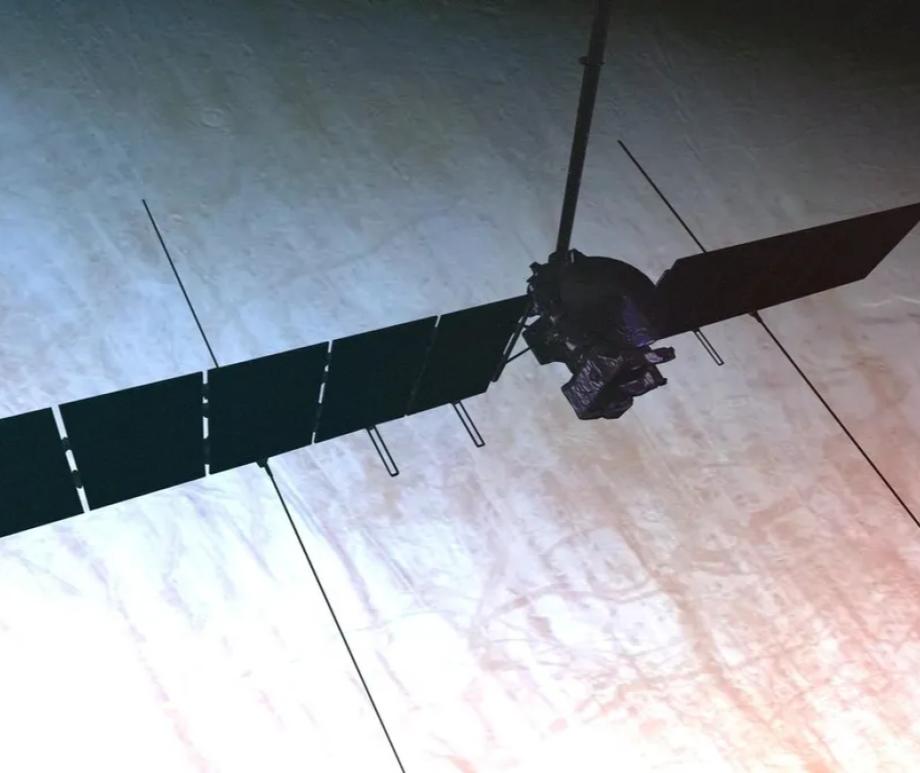 An illustration of the Europa Clipper spacecraft with its solar arrays, magnetometer's boom and several antennas for the radar instrument deployed