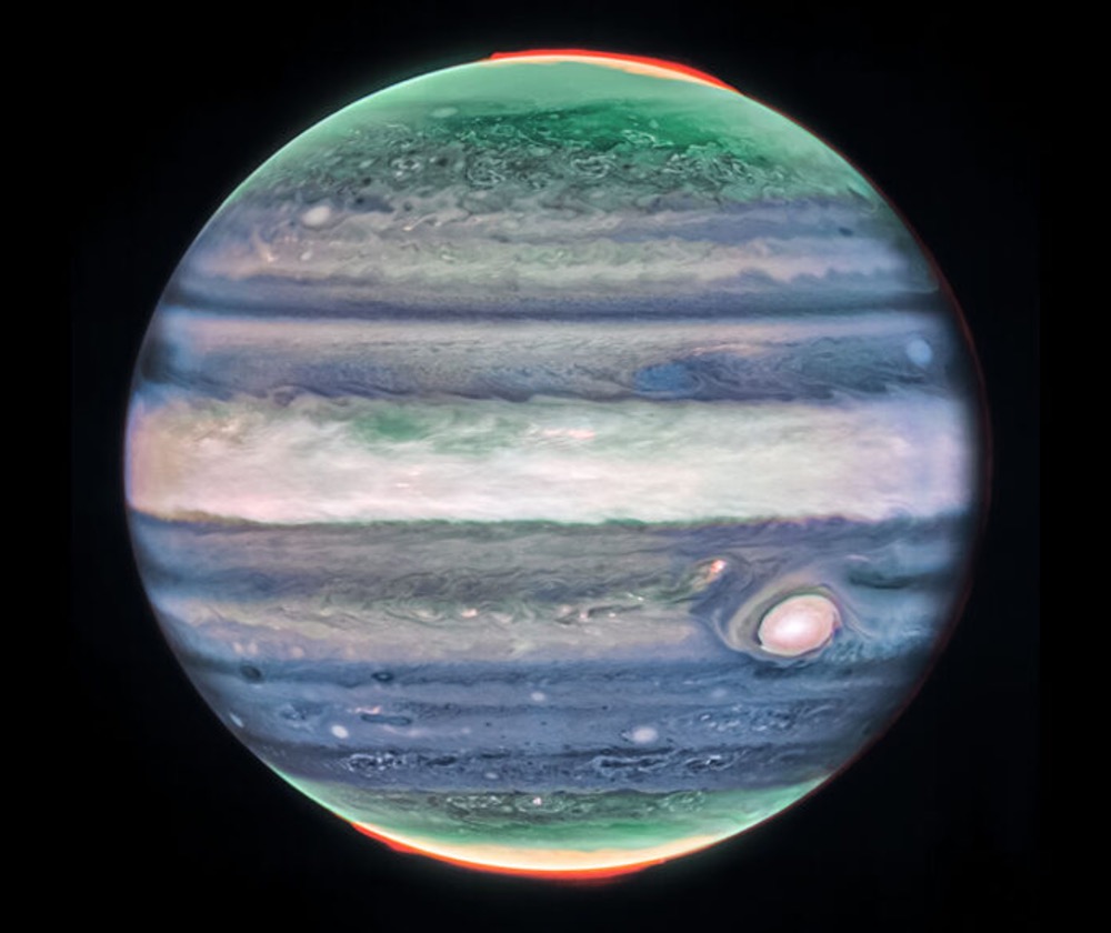 This false-color image reveals new details of Jupiter’s atmosphere. A thick band of clouds circles the equator
