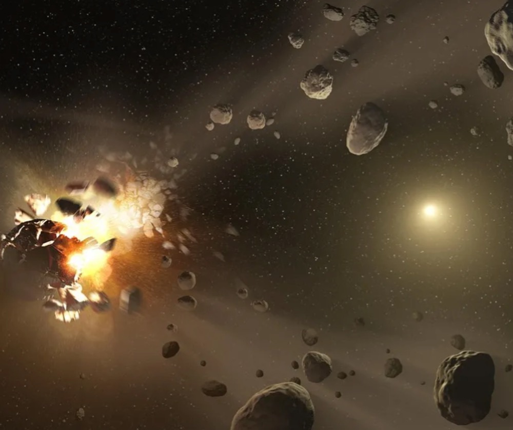 An artist’s impression of an asteroid collision that subsequently forms a family of smaller asteroids