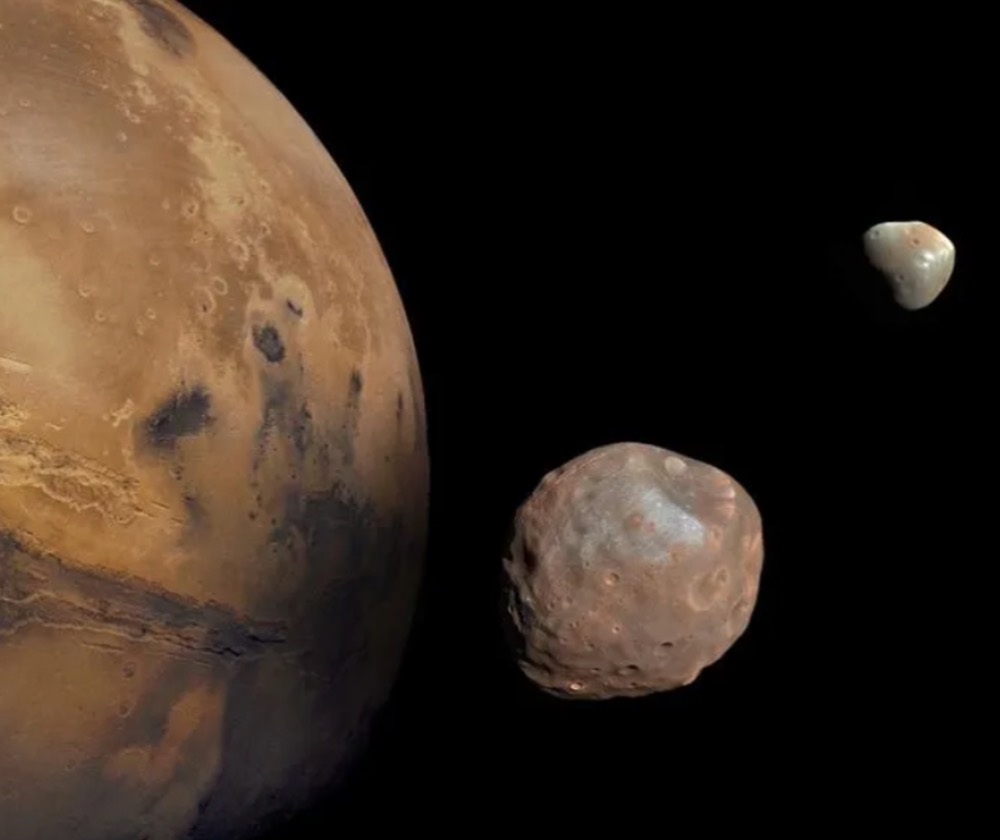 A composite photo of Mars with its twin moons Phobos and Deimos