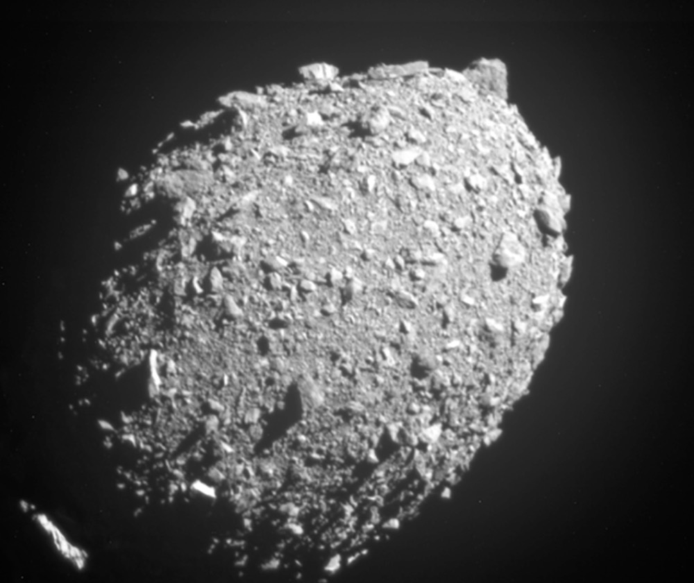 Asteroid moonlet Dimorphos as seen by NASA's DART spacecraft 11 seconds before the impact that shifted its path through space, in the first test of asteroid deflection