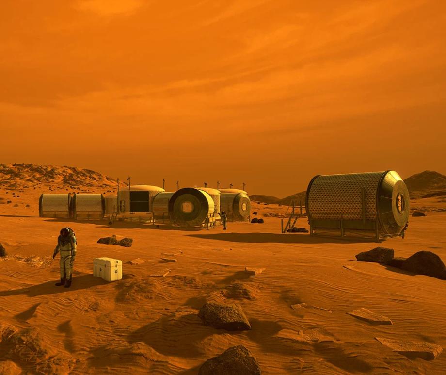 Astronauts working outside a habitat on the surface of Mars.