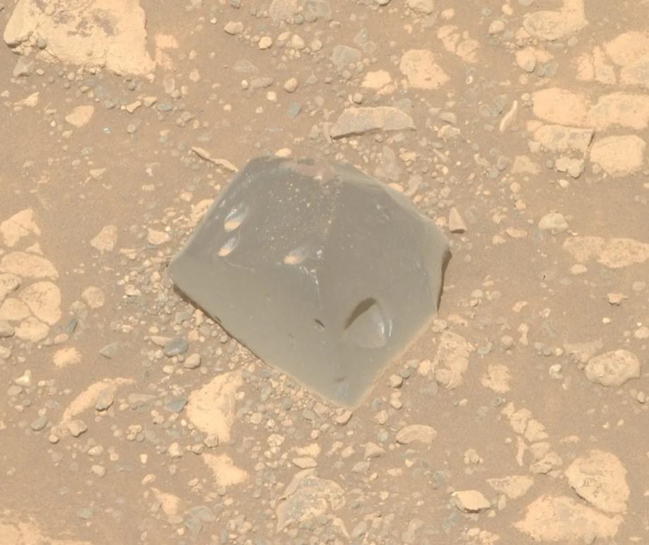 NASA's Perseverance rover found an unusual dark, pitted rock dubbed Skull Hill while exploring Jezero Crater's rim