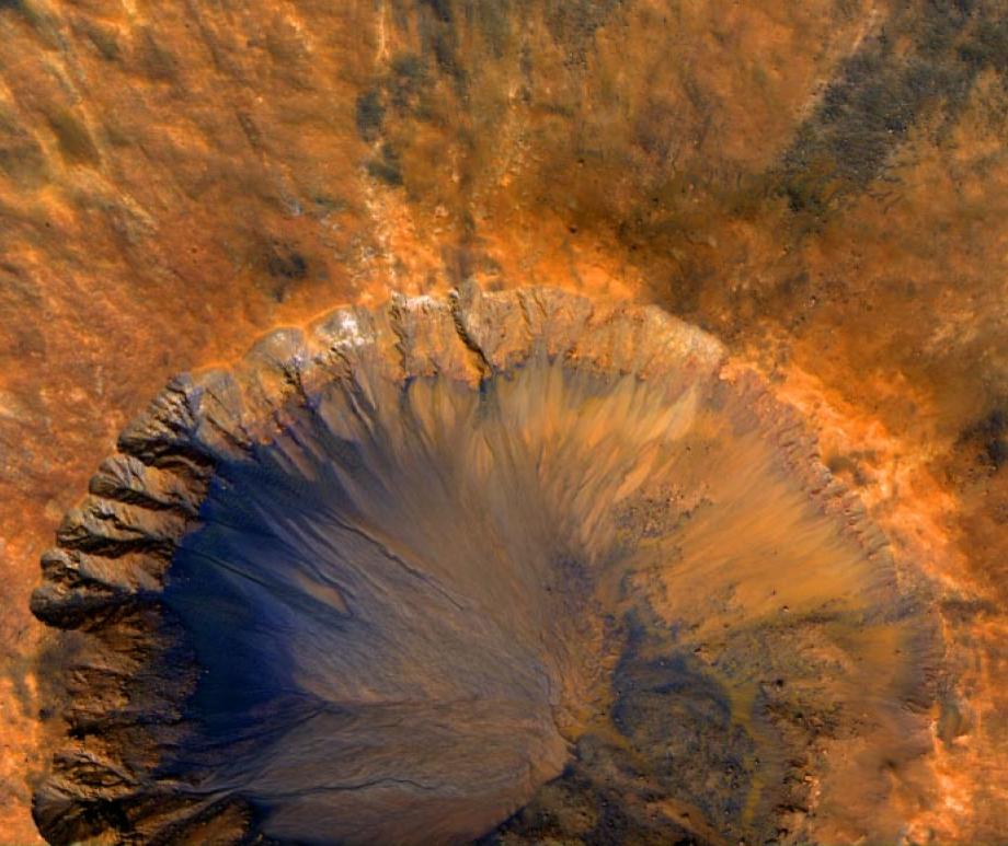 This image of an impact crater in the Sirenum Fossae region of Mars was taken by NASA’s Mars Reconnaissance Orbiter on March 30, 2015