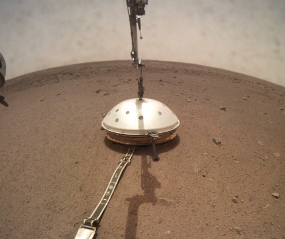 NASA's InSight lander deployed its Wind and Thermal Shield on February 2 (Sol 66)