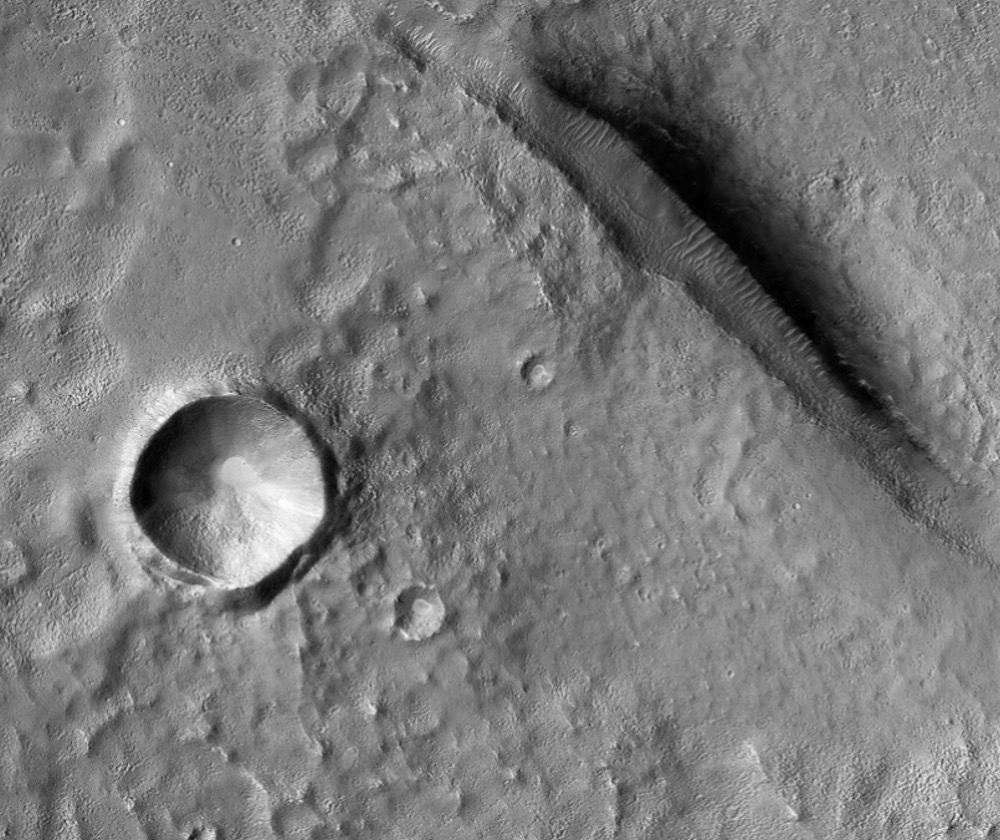 A network of polygon-shaped cracks were detected dozens of meters below Utopia Planitia on Mars