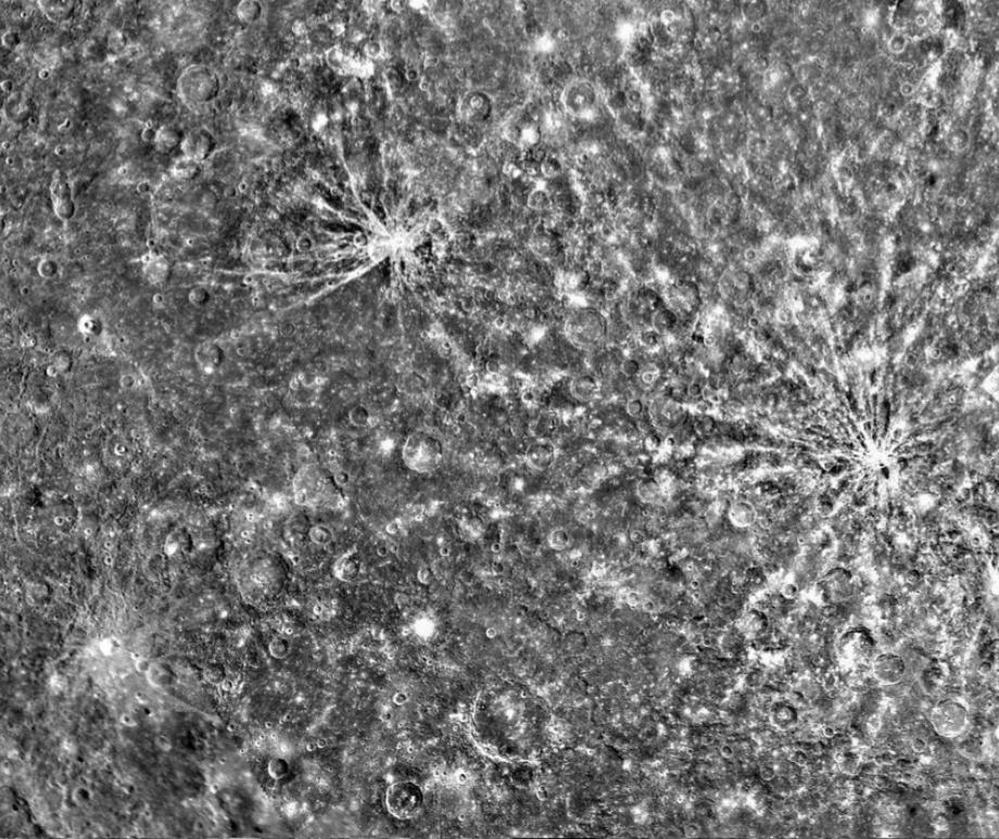 the streaks or ‘lineae’ on the slopes of a crater wall on Mercury and the bright hollows from which the streaks originate.