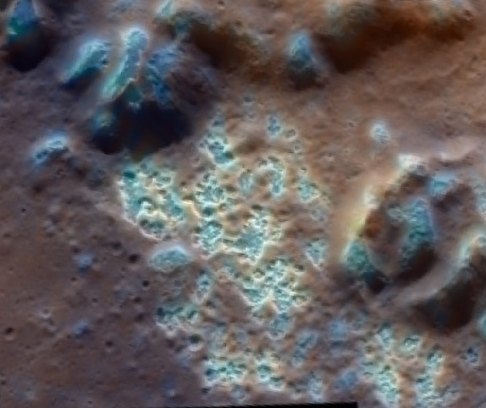 The Central Peak of the 163-milewide (263 km) Raditladi impact basin is marked by hollows in this mosaic from the MESSENGER orbiter