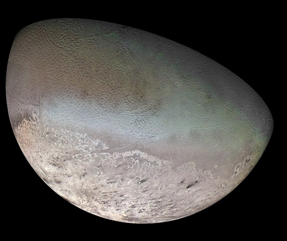Global color mosaic of Neptune's largest moon, Triton, taken by NASA's Voyager 2 in 1989