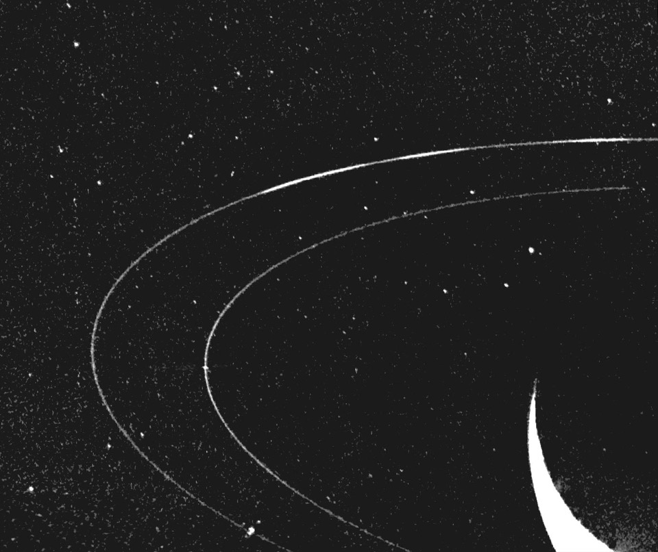 In Neptune's outermost ring, 39,000 miles out, material mysteriously clumps into three arcs