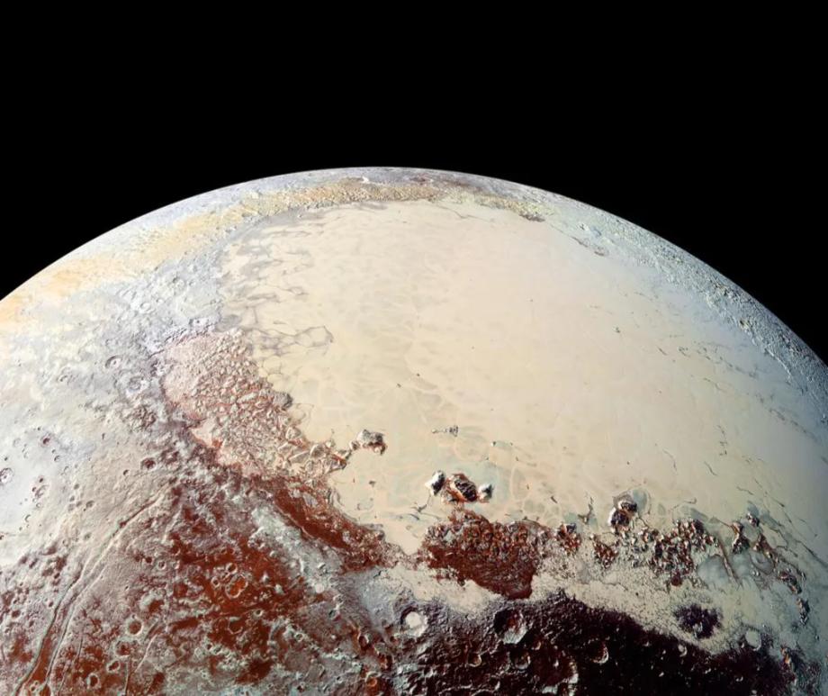 This high-resolution image captured by NASA's New Horizons spacecraft combines blue, red and infrared images to show a bright expanse on Pluto known as Sputnik Planum