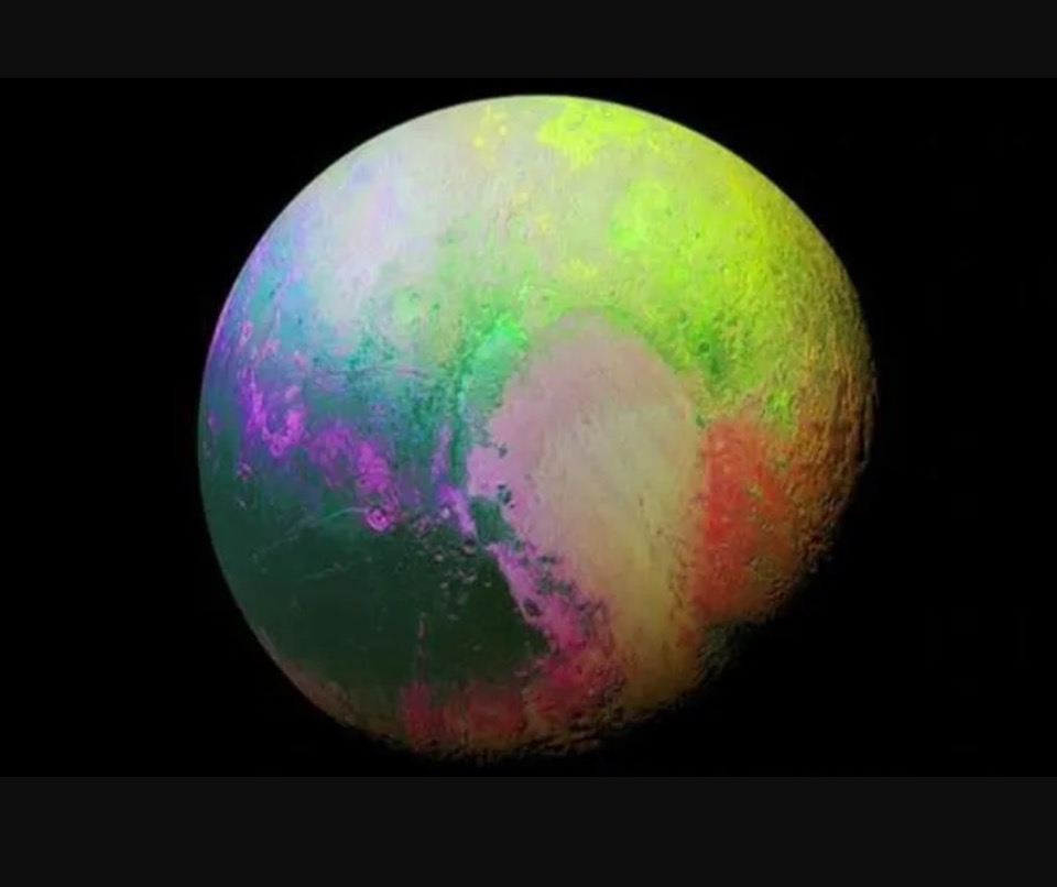 Pluto gets splashed in a dash of colors to highlight its varied geography
