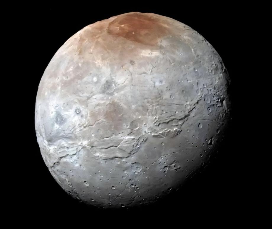 False-color image of Charon using red, blue, and infrared filters to highlight specific surface features