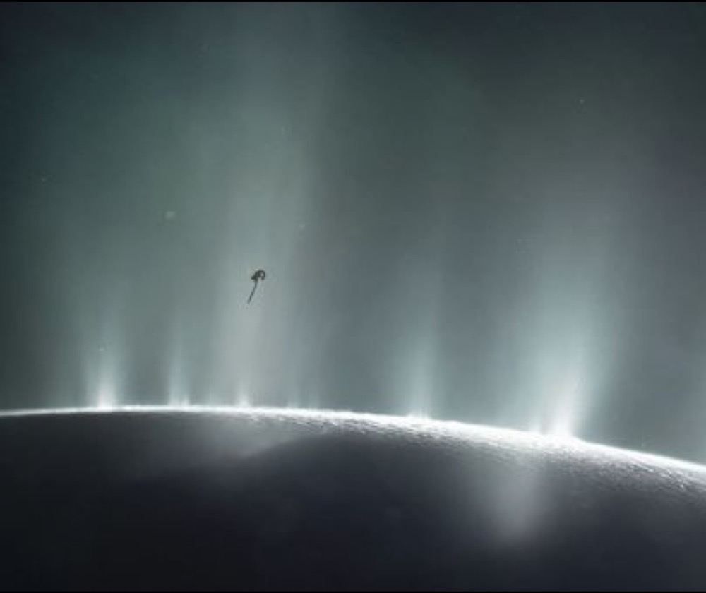 Artist’s illustration of Cassini flying through the water vapor plumes of Enceladus.