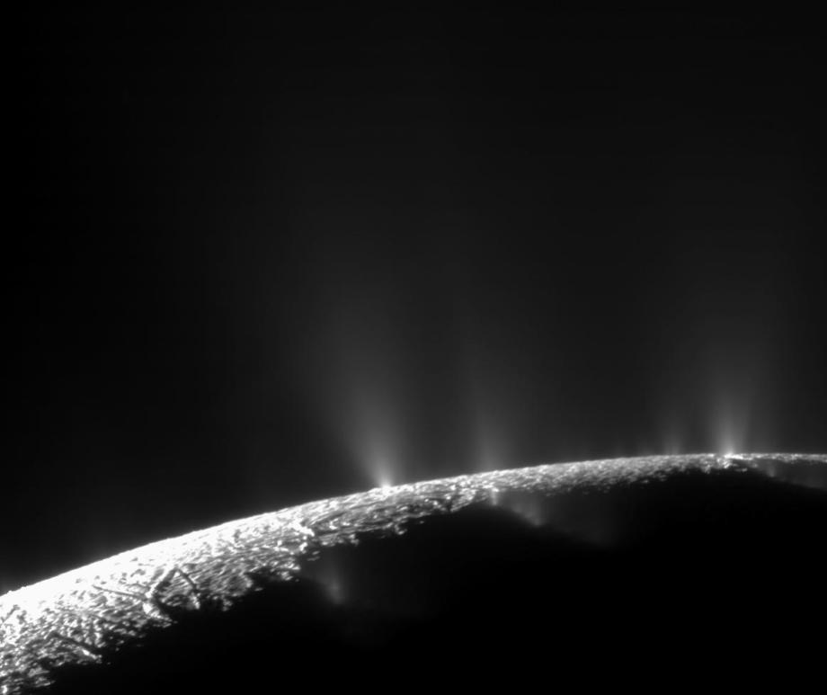 In this image captured by NASA’s Cassini spacecraft in 2009, dramatic plumes of water ice and vapor are seen erupting from the south pole of Saturn’s moon Enceladus.