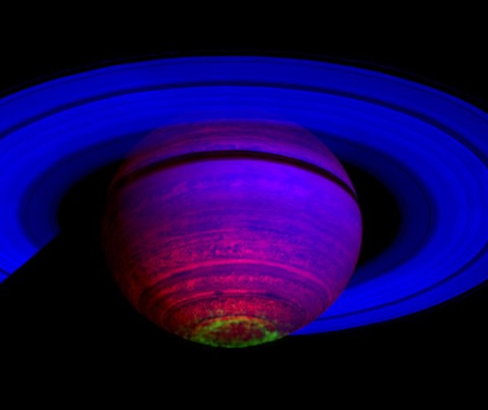 Infrared image of Saturn showing an aurora at its southern pole, captured by the Cassini spacecraft.