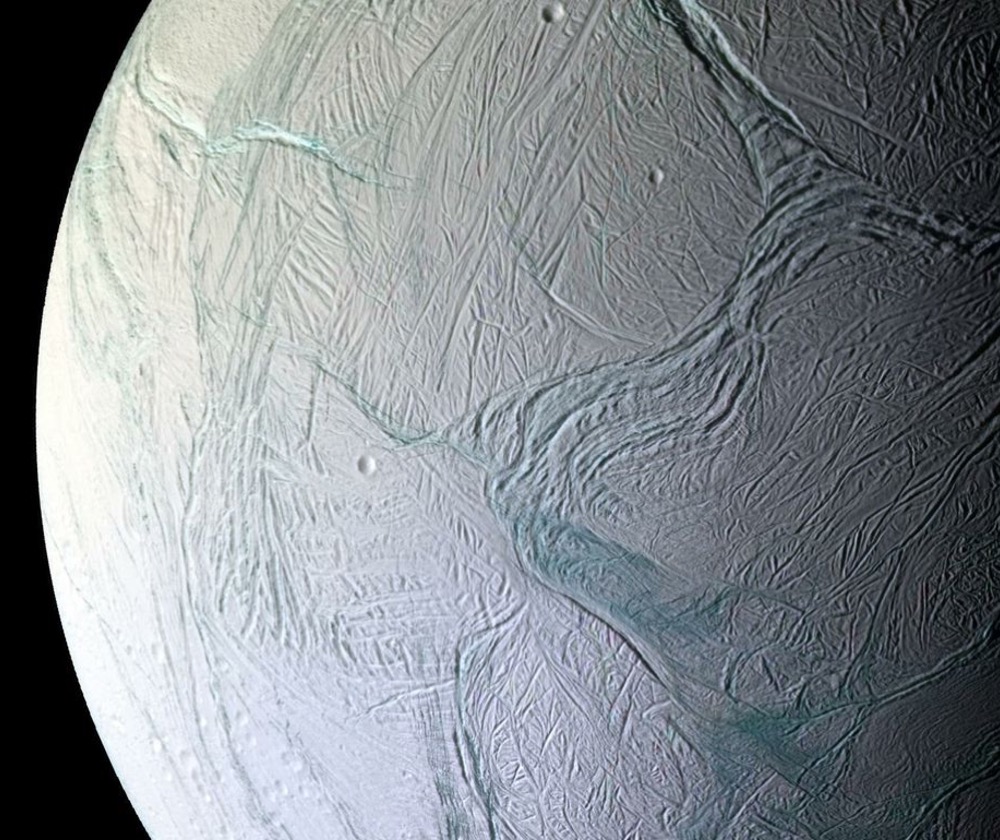Enceladus has the whitest and most reflective surface that astronomers have yet observed, and it’s known for spraying out tiny icy silica particles