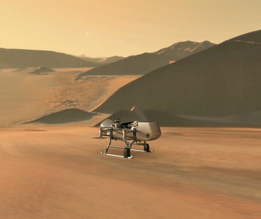 This illustration shows NASA’s Dragonfly rotorcraft-lander approaching a site on Saturn’s exotic moon, Titan