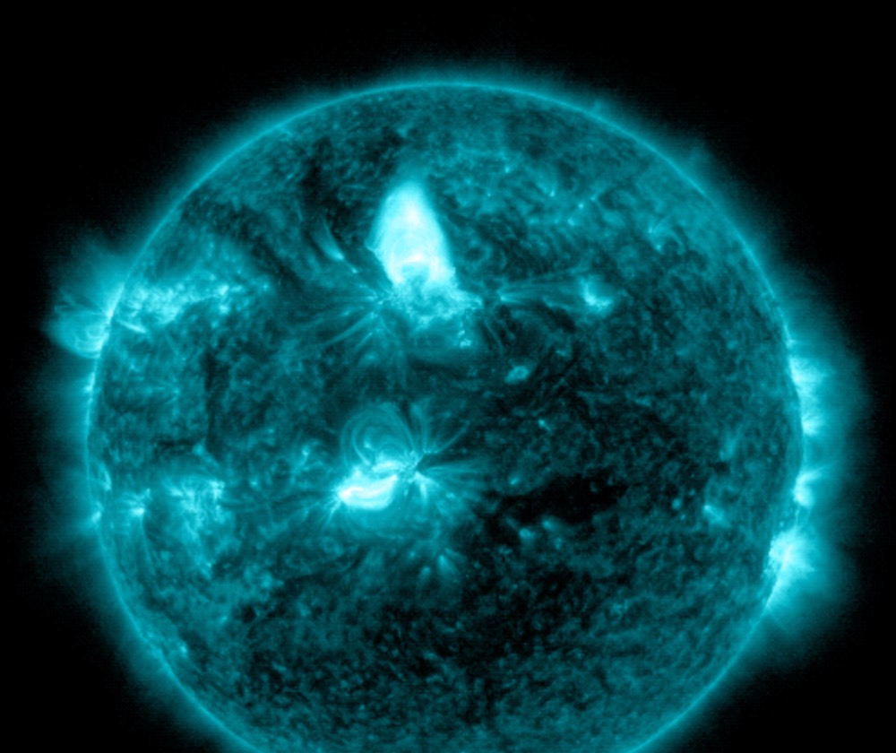 NASA’s Solar Dynamics Observatory captured this image of a solar flare – as seen in the bright flash near the center and top of the Sun’s disk – on March 23