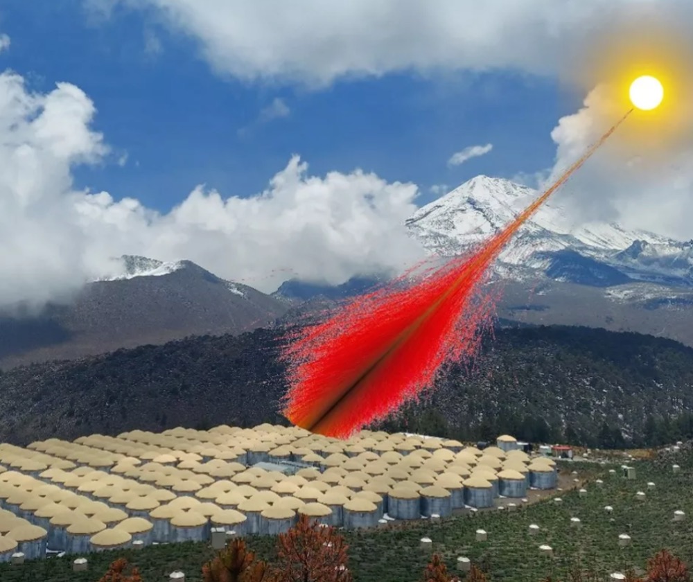 A composite image shows a photograph of the High-Altitude Water Cherenkov Observatory in Mexico observing particles, whose paths are shown as red lines, generated by high-energy gamma rays from the sun