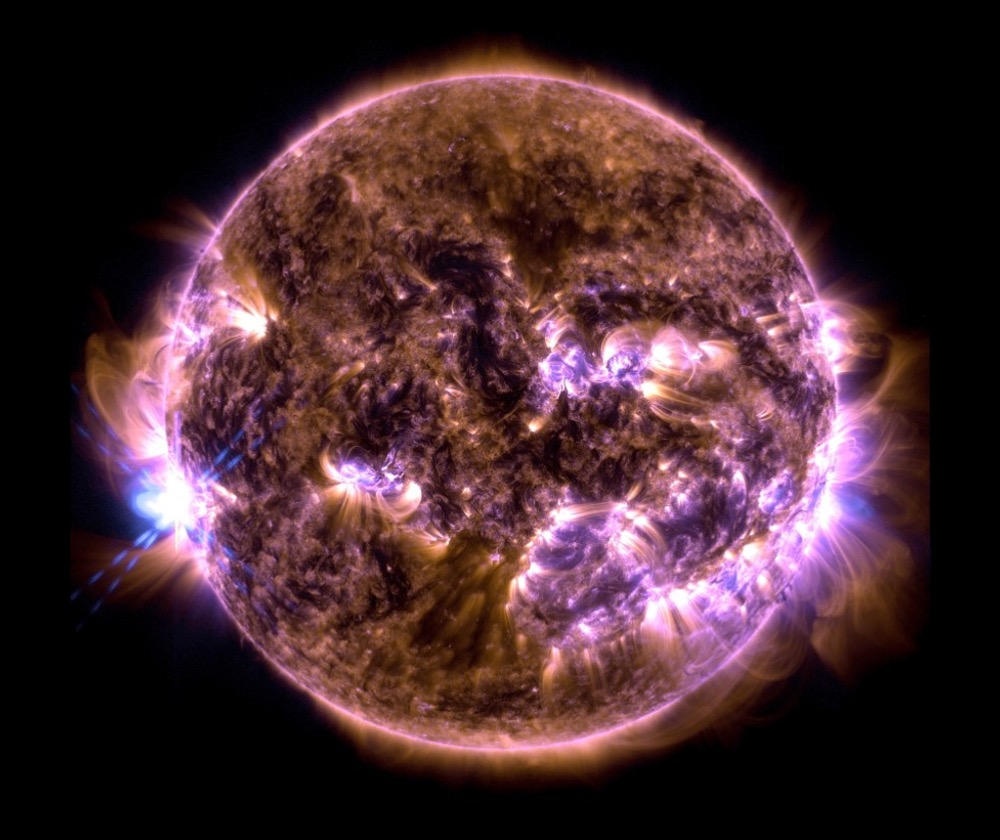 NASA’s Solar Dynamics Observatory captured this image of a solar flare — seen as the bright flash on the left — on Sept. 12, 2024