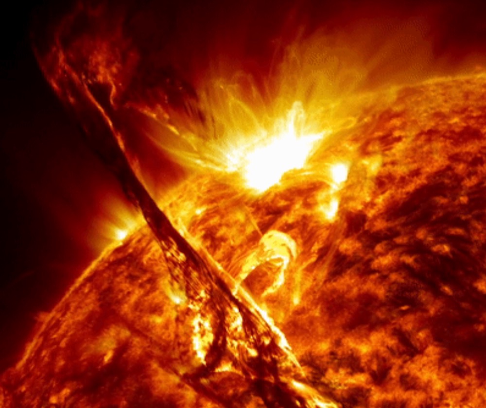 Solar flare erupting from the surface of the sun