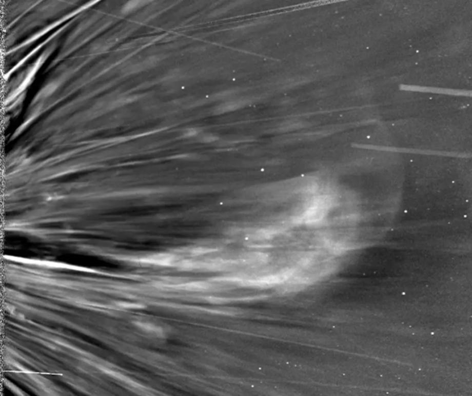 An image from NASA's Parker Solar Probe showing solar material changing directions.