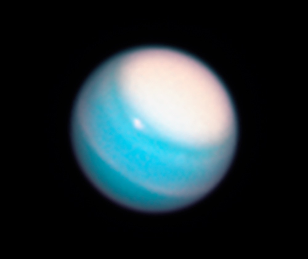 This Hubble Space Telescope Wide Field Camera 3 image of Uranus, taken in November 2018, reveals a vast, bright stormy cloud cap across the planet's north pole