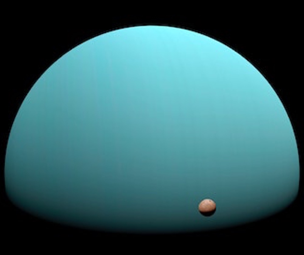 Uranus with one of its moons