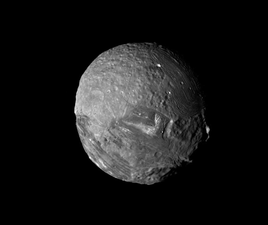 Unique geologic features on Uranus’ moon Miranda (seen here in a photo taken by Voyager 2 in 1986) may have been created by thinning of the moon’s icy shell.